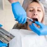 how long does it take for a tooth extraction to recover